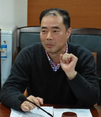 朱毅民出席经法委调研课题研讨会